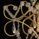 Lampa wisząca o złotym wykończenie z wiszącymi kryształkami MW-LIGHT Crystal 373014503