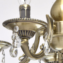 Metalowy żyrandol w kolorze antycznego mosiądzu i z kryształami Aurora MW-LIGHT 371011605