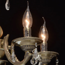 Metalowy żyrandol w kolorze antycznego mosiądzu i z kryształami Aurora MW-LIGHT 371011605