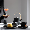 Miseczka z czarnej porcelany Pekoë Revol RV-653619-4