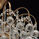 Ozdobny żyrandol w mosiężnym kolorze z kryształami do salonu jadalni Pearls 232016506