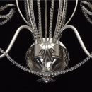 Podwójny kinkiet w kształcie świecznika o srebrnej powłoce i kryształami Chiaro 299021002