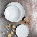 Talerz głęboki na owoce morza 24 cm, porcelanowy Revol Swell biały piasek RV-653528-6